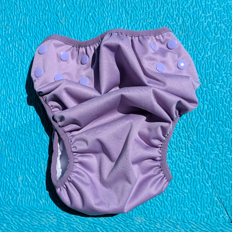 Couche de bain lavable pour enfants et adultes avec besoins spéciaux